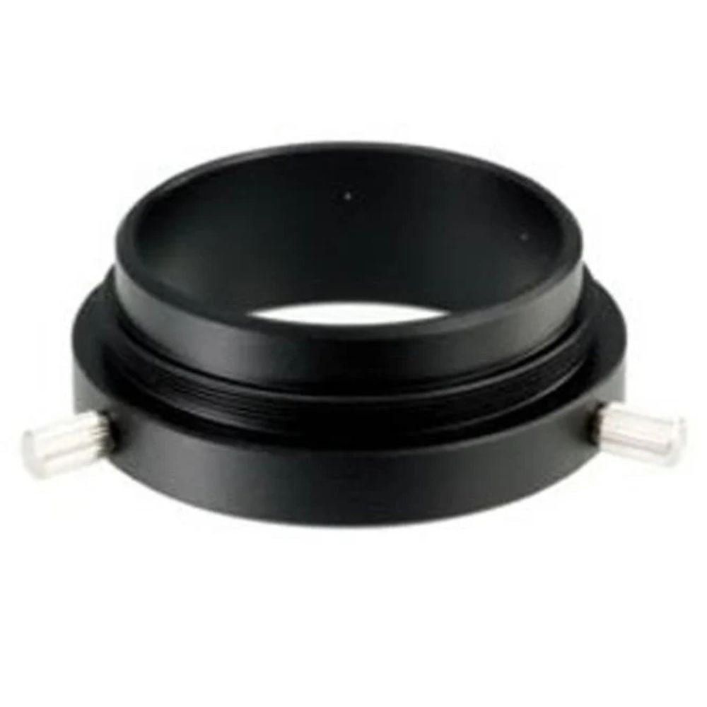 Black metal ring with two metallic studs on a white background